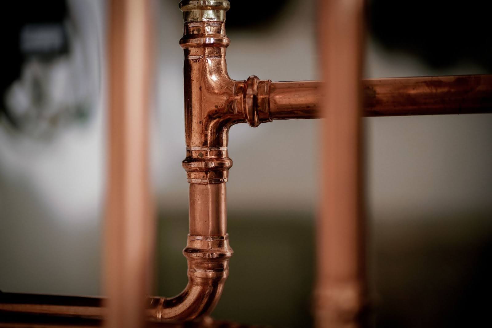 A close-up image of copper piping.