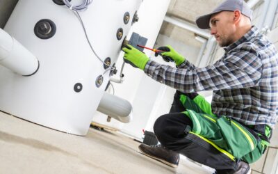 Technician Working On A Boiler Repairs.